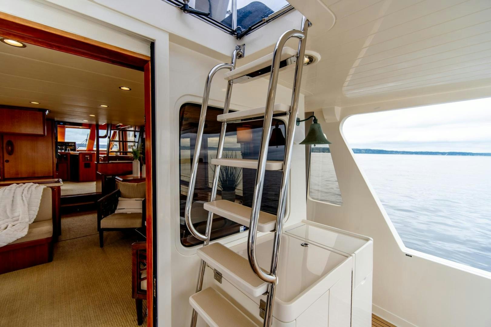 a ladder in a room aboard HONORE Yacht for Sale