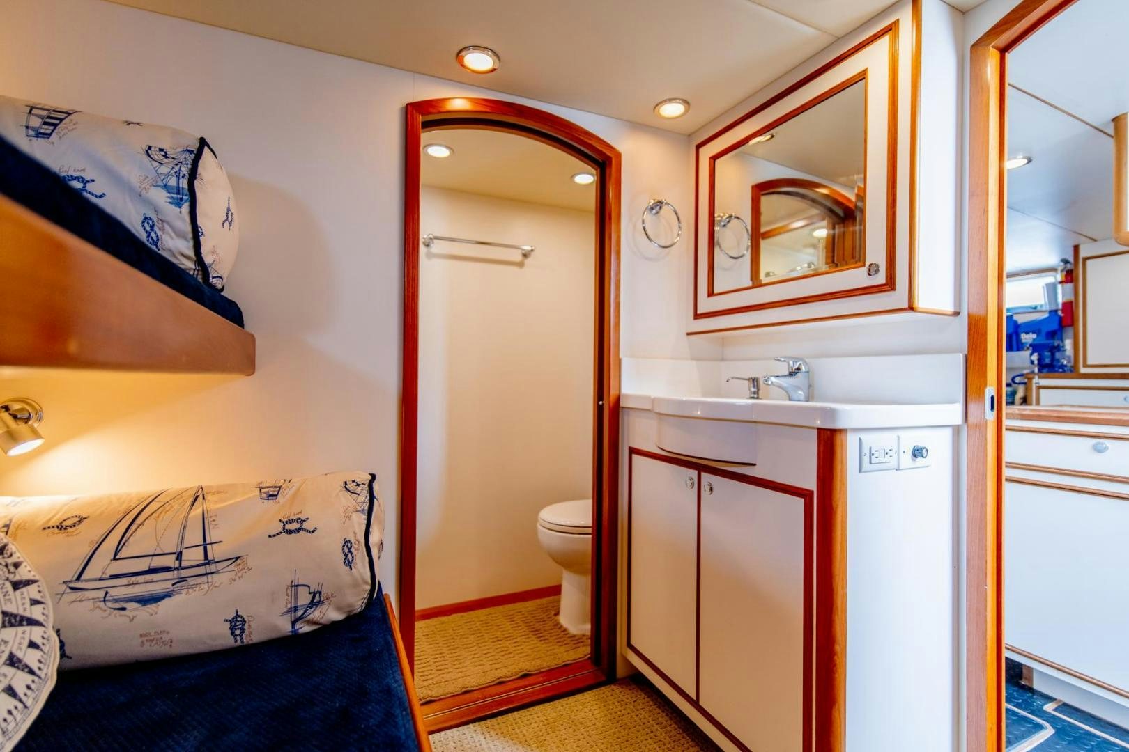 a bathroom with a shower and a sink aboard HONORE Yacht for Sale