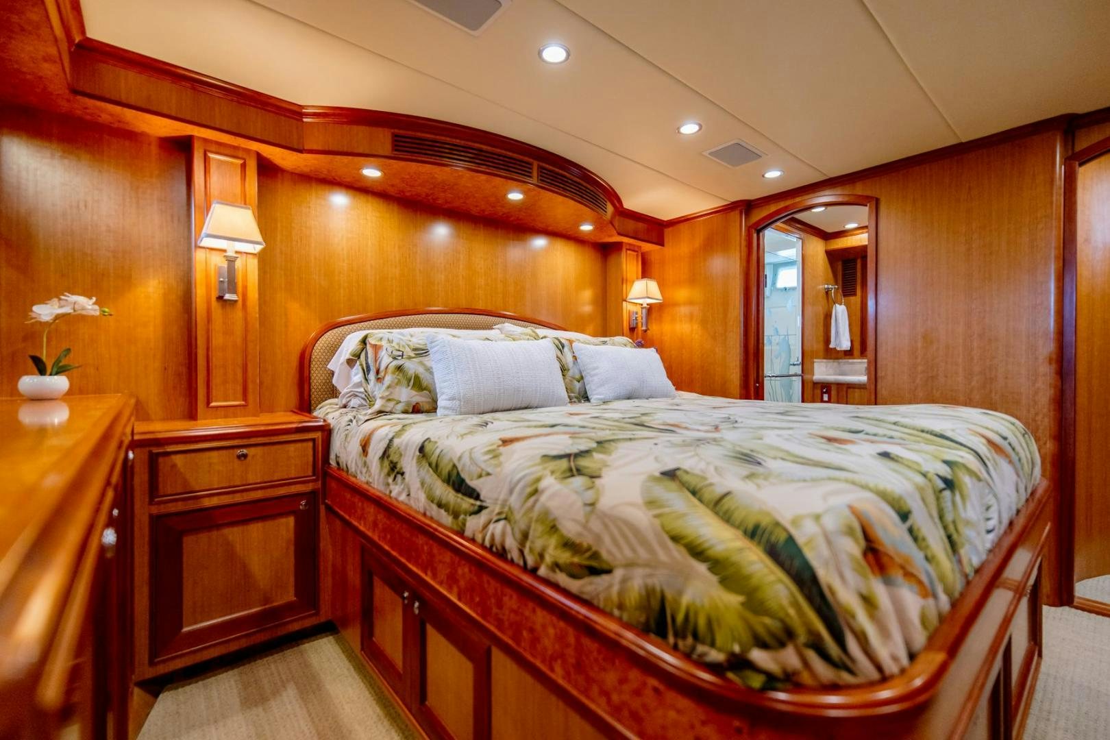 a bed in a room aboard HONORE Yacht for Sale