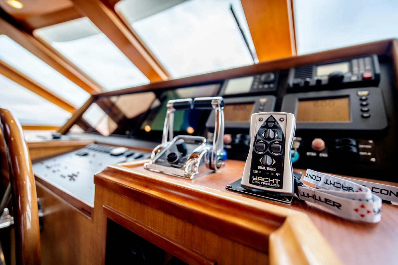 a couple of electronic devices on a table aboard HONORE Yacht for Sale