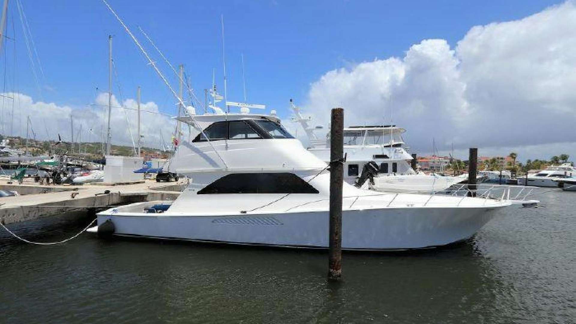 a boat docked at a pier aboard Knot Normal Yacht for Sale