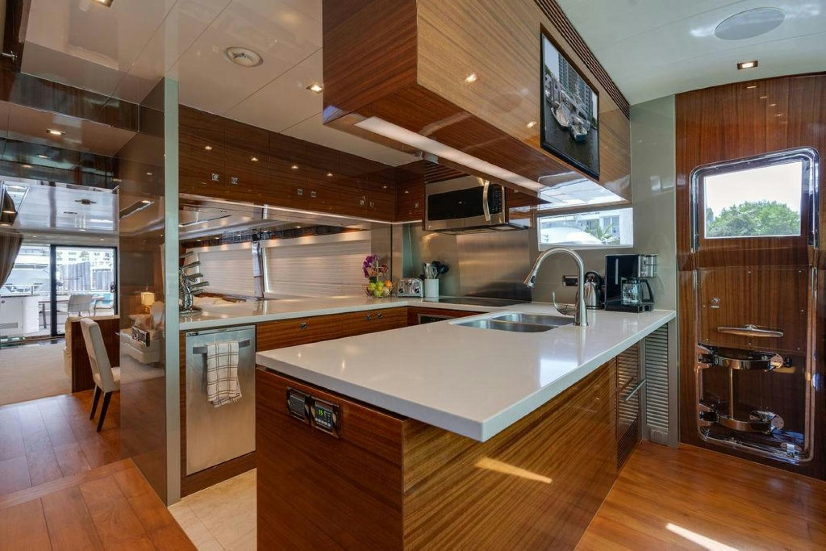 a kitchen with a large island aboard AQUA LIFE Yacht for Sale