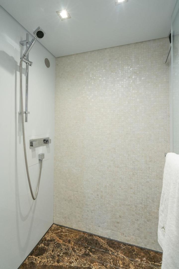 a white wall with a towel from it aboard AQUA LIFE Yacht for Sale