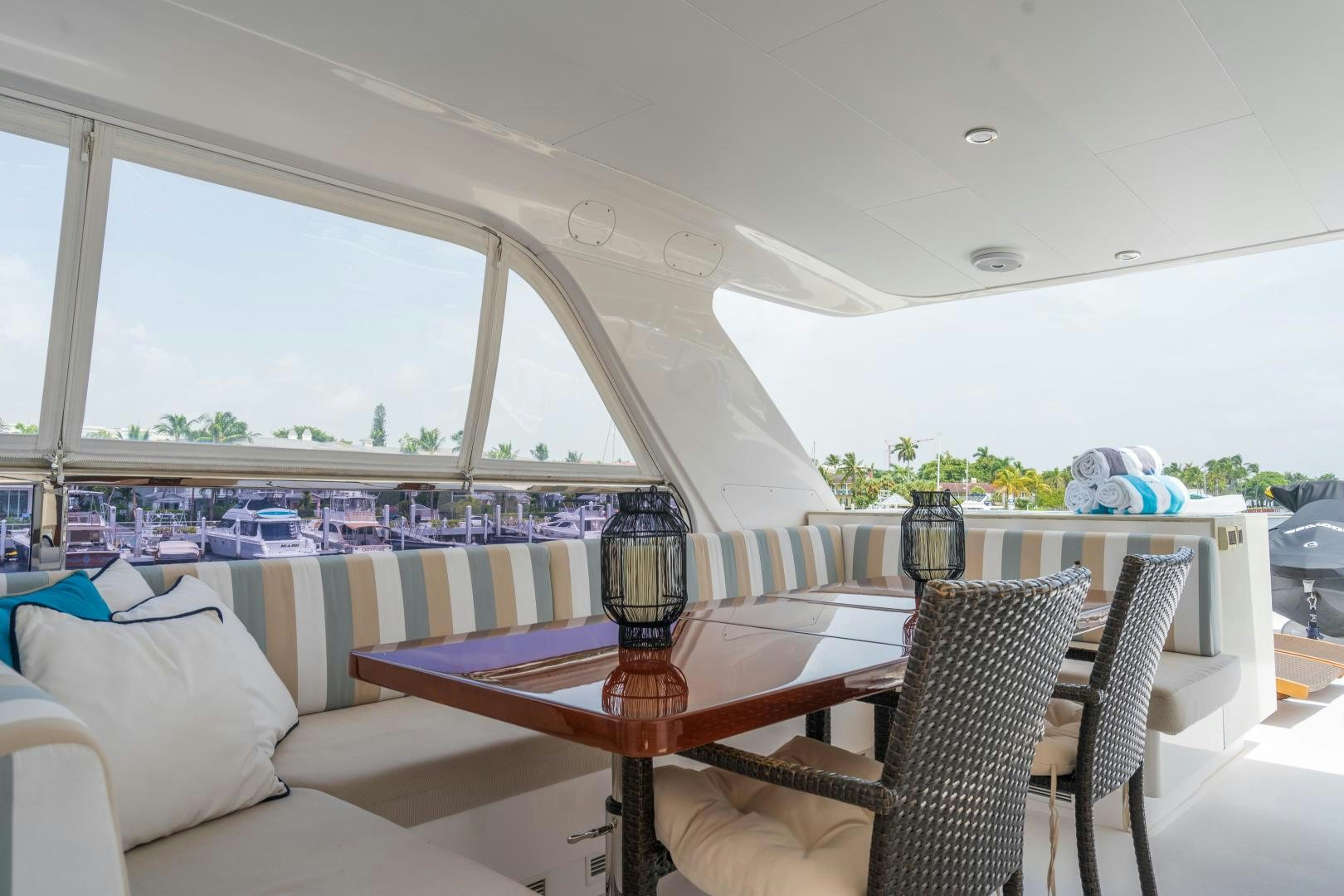 a table and chairs in a room aboard AQUA LIFE Yacht for Sale