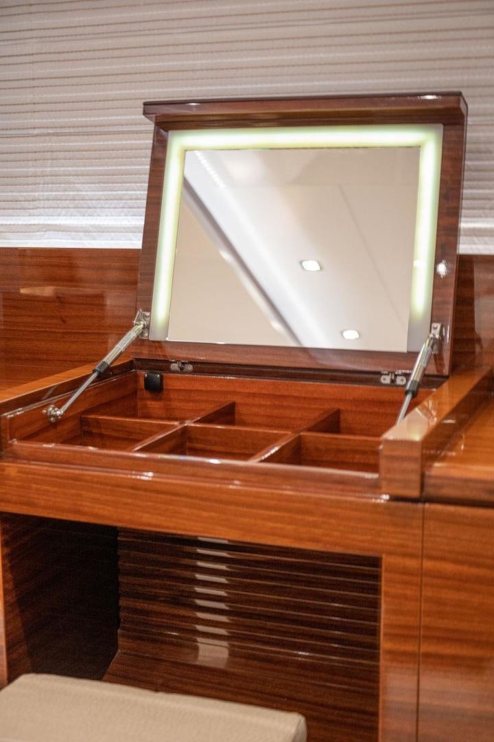 a tv on a wall aboard AQUA LIFE Yacht for Sale