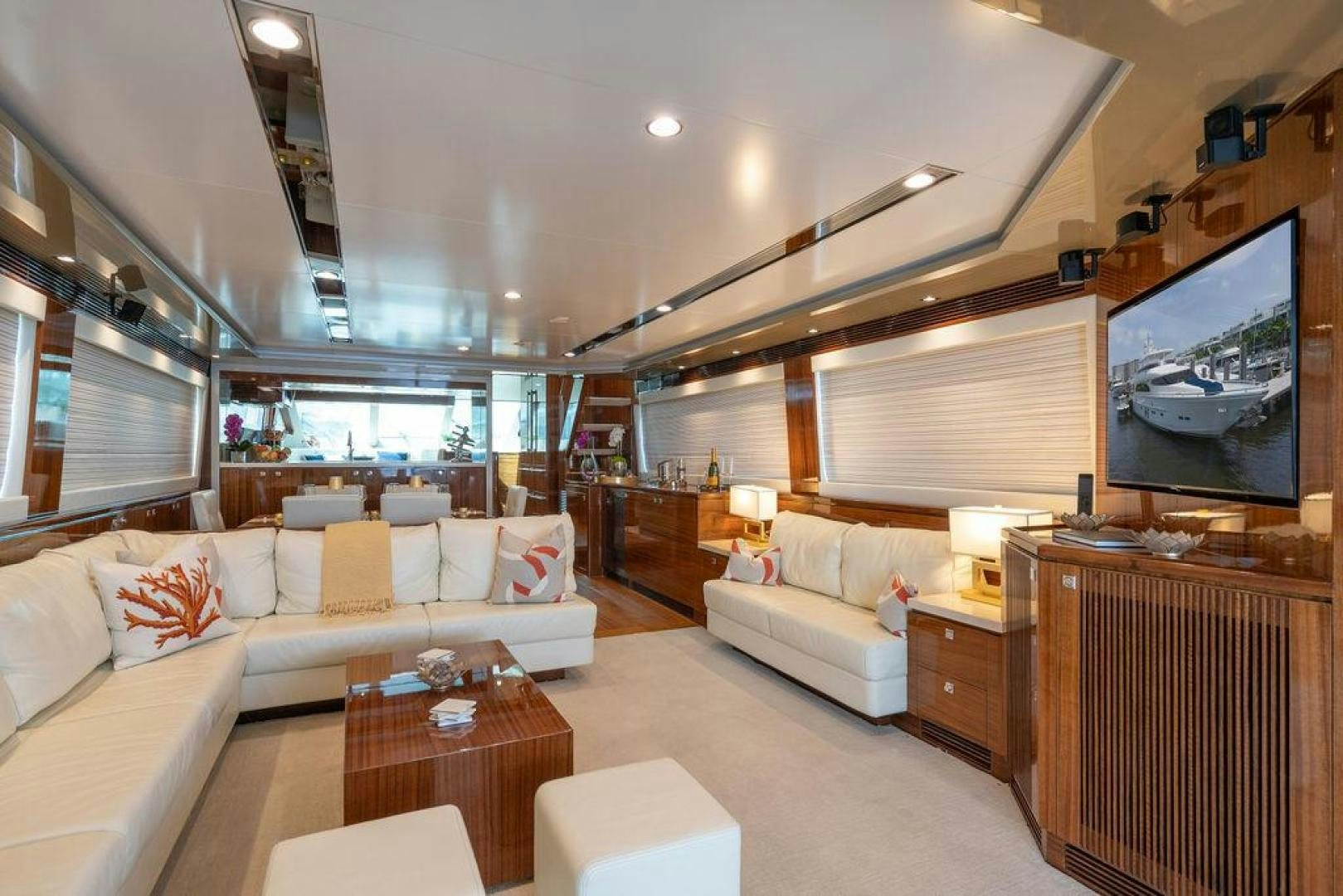 a living room with a large window aboard AQUA LIFE Yacht for Sale