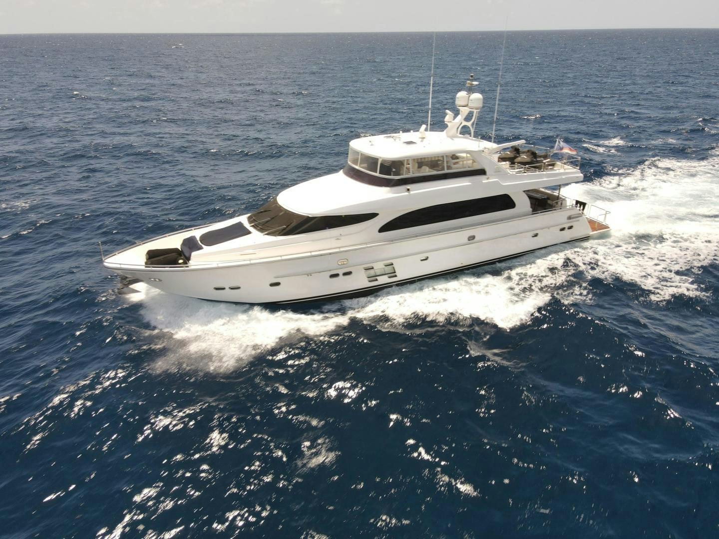 a white yacht on the water aboard AQUA LIFE Yacht for Sale