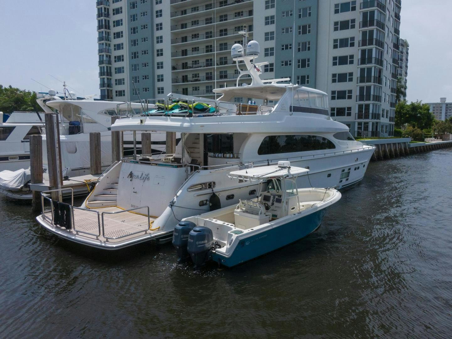 a boat docked at a pier aboard AQUA LIFE Yacht for Sale