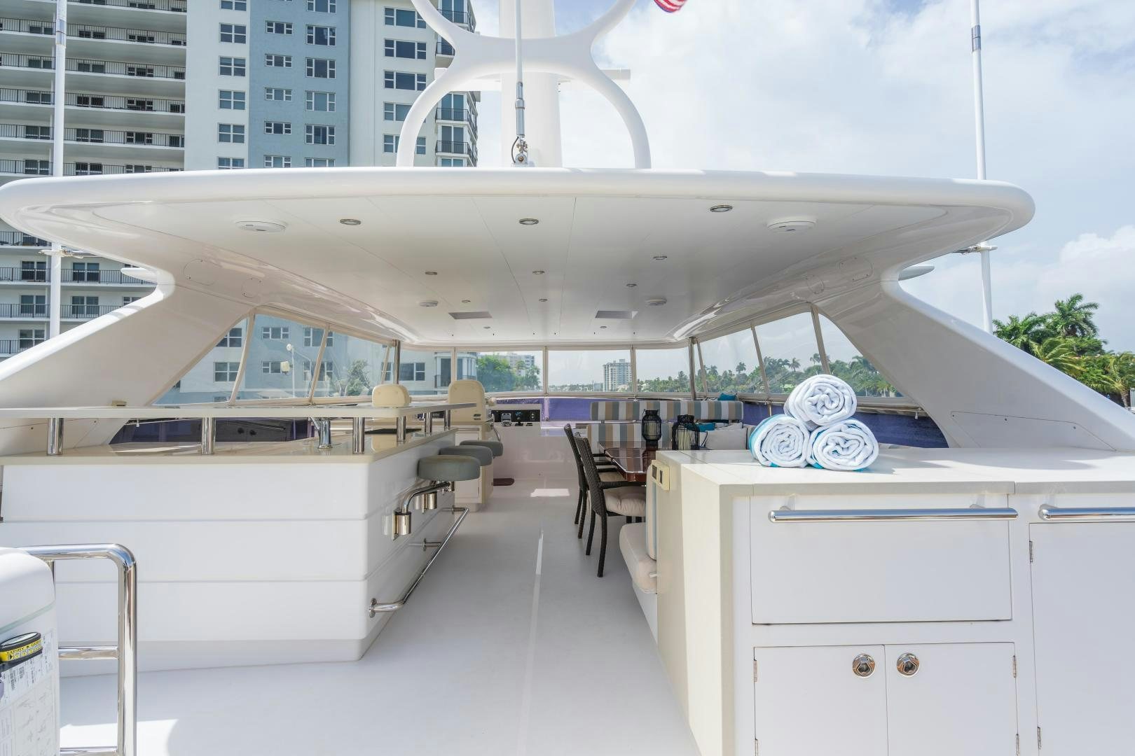 a white building with a white roof aboard AQUA LIFE Yacht for Sale