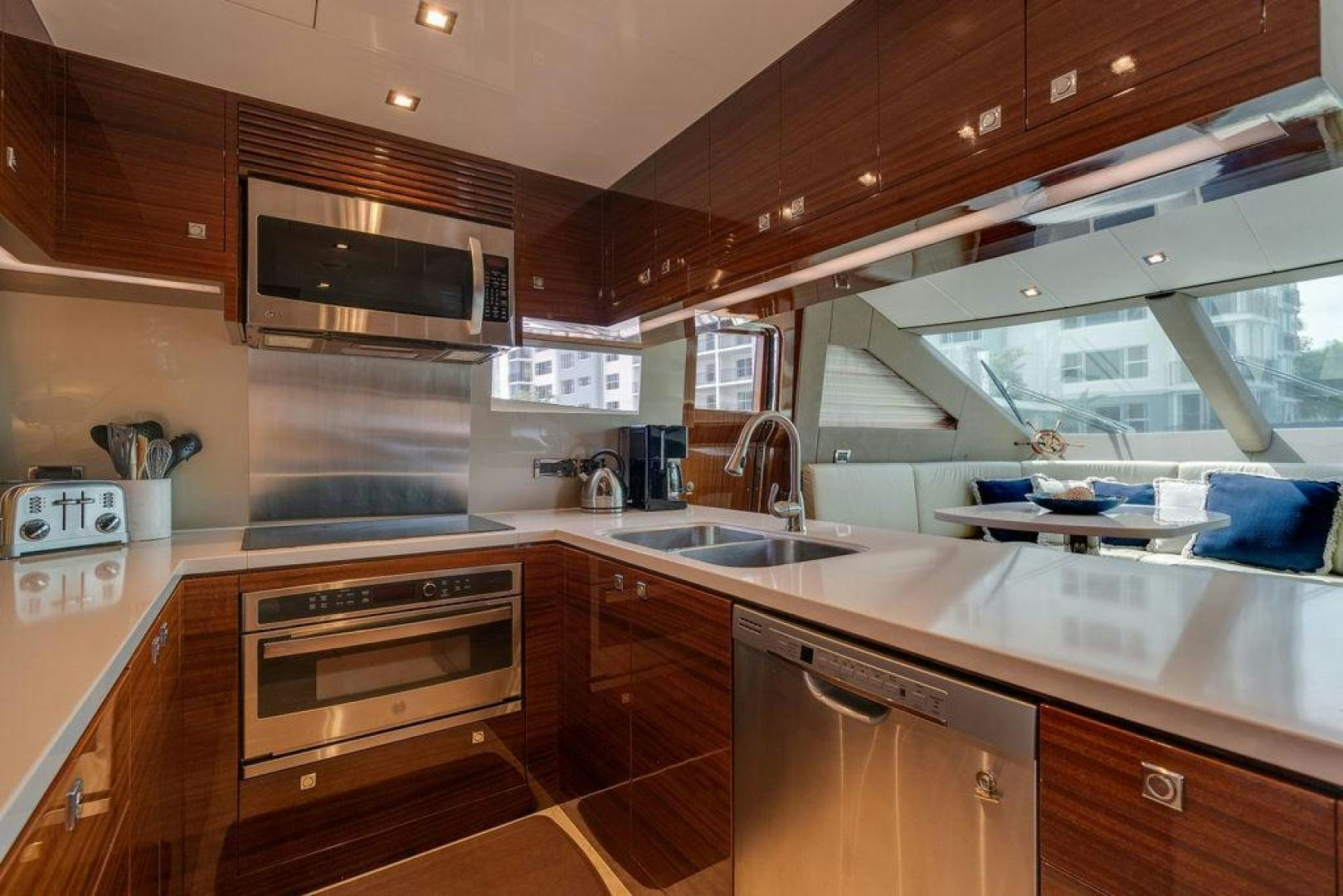 a kitchen with a sink and a stove aboard AQUA LIFE Yacht for Sale