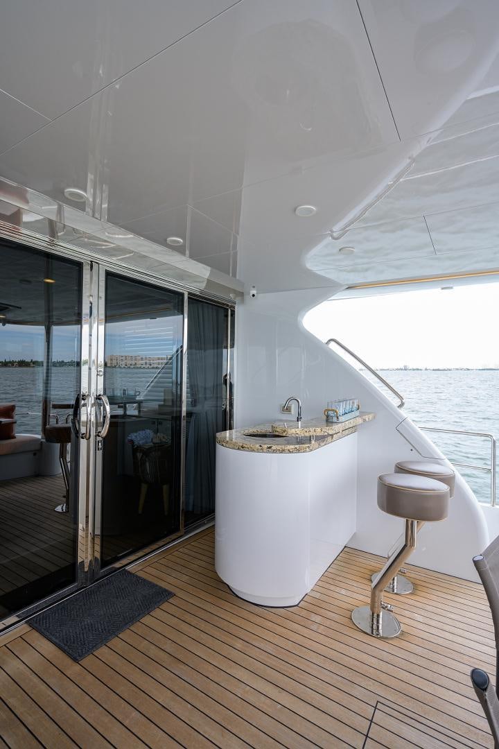 a bathroom with a sink and a shower aboard MY 3 GALS Yacht for Sale