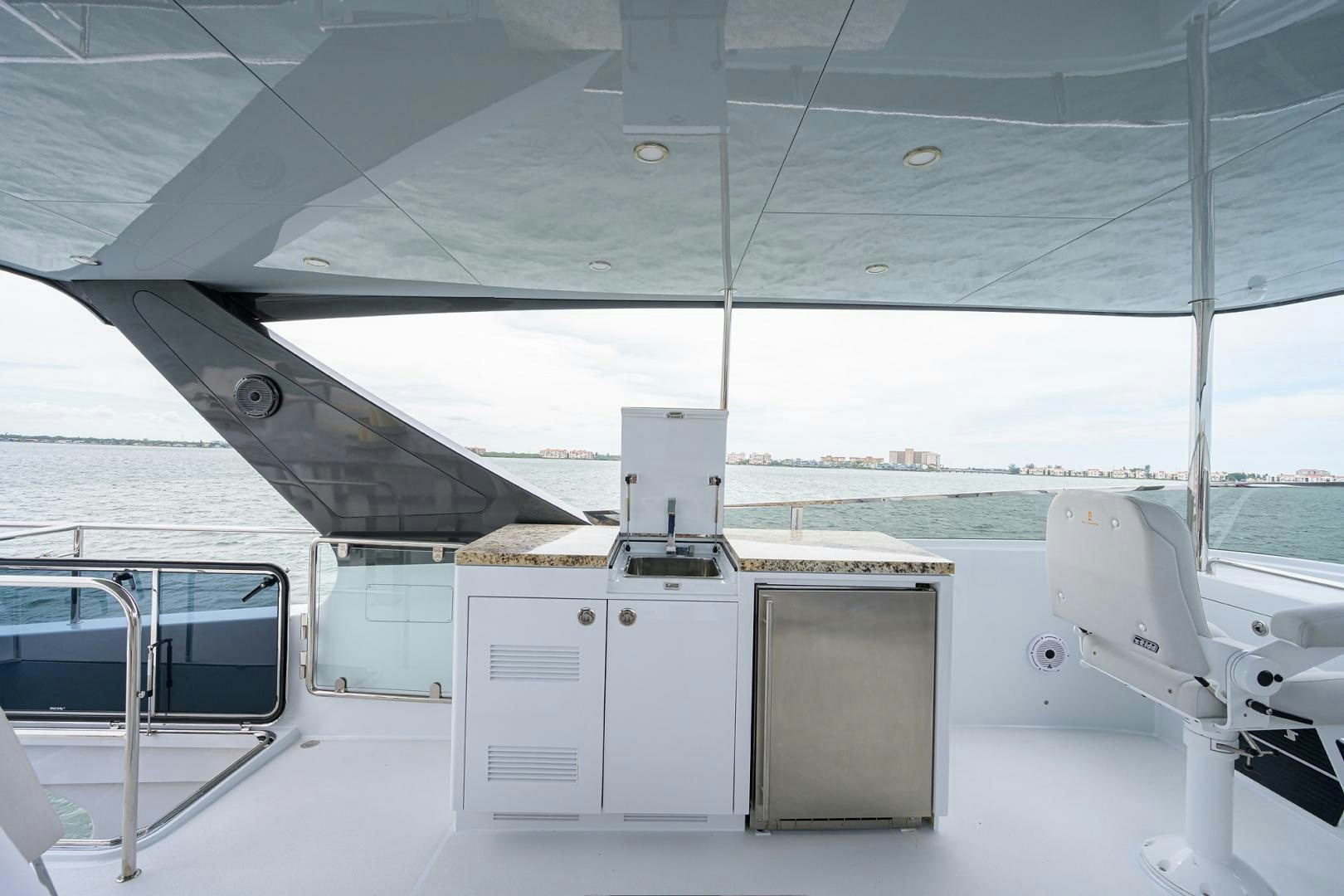 a boat with a sink and a microwave aboard MY 3 GALS Yacht for Sale