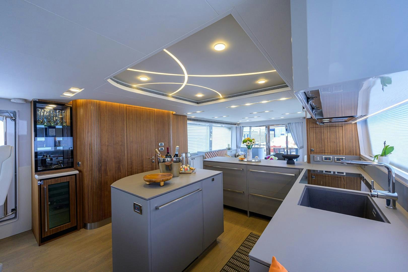 a kitchen with a large island aboard MY 3 GALS Yacht for Sale