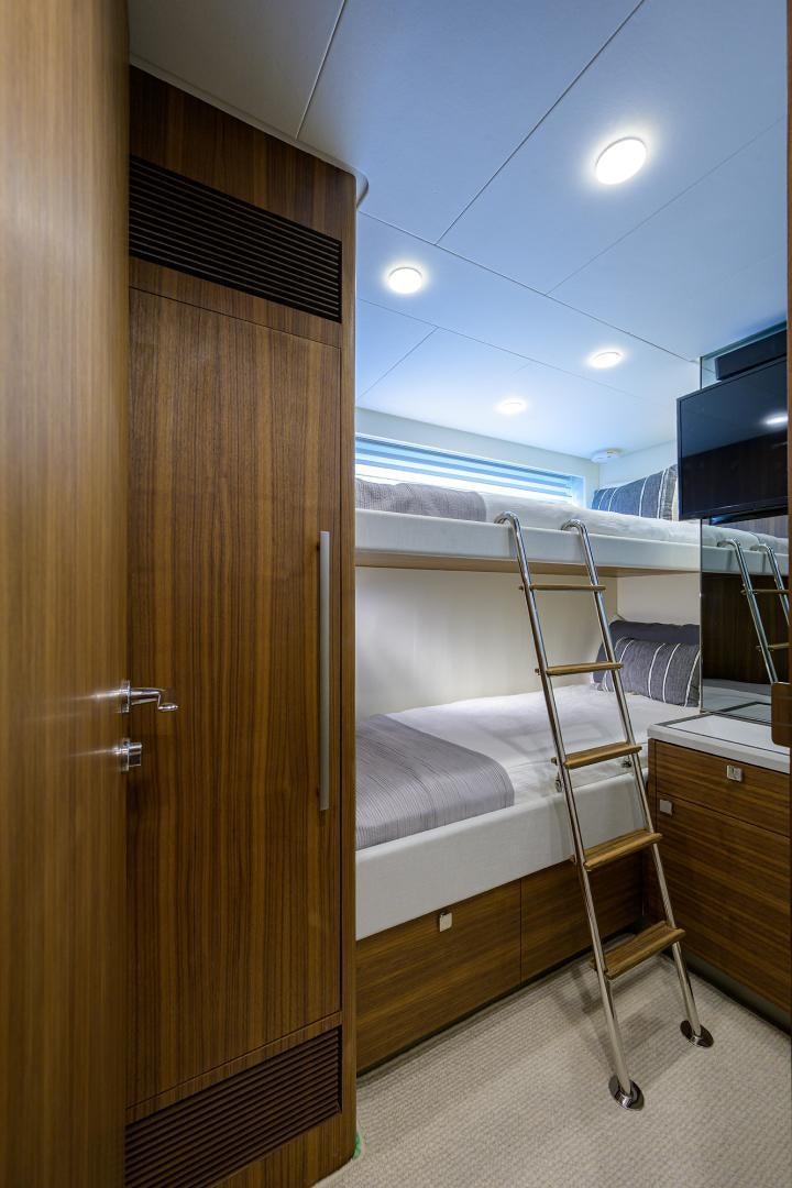 a bunk bed in a room aboard MY 3 GALS Yacht for Sale