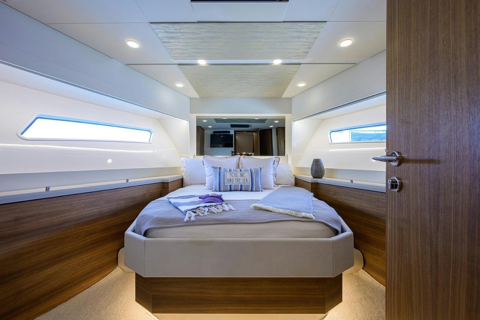 a bed in a room aboard MY 3 GALS Yacht for Sale