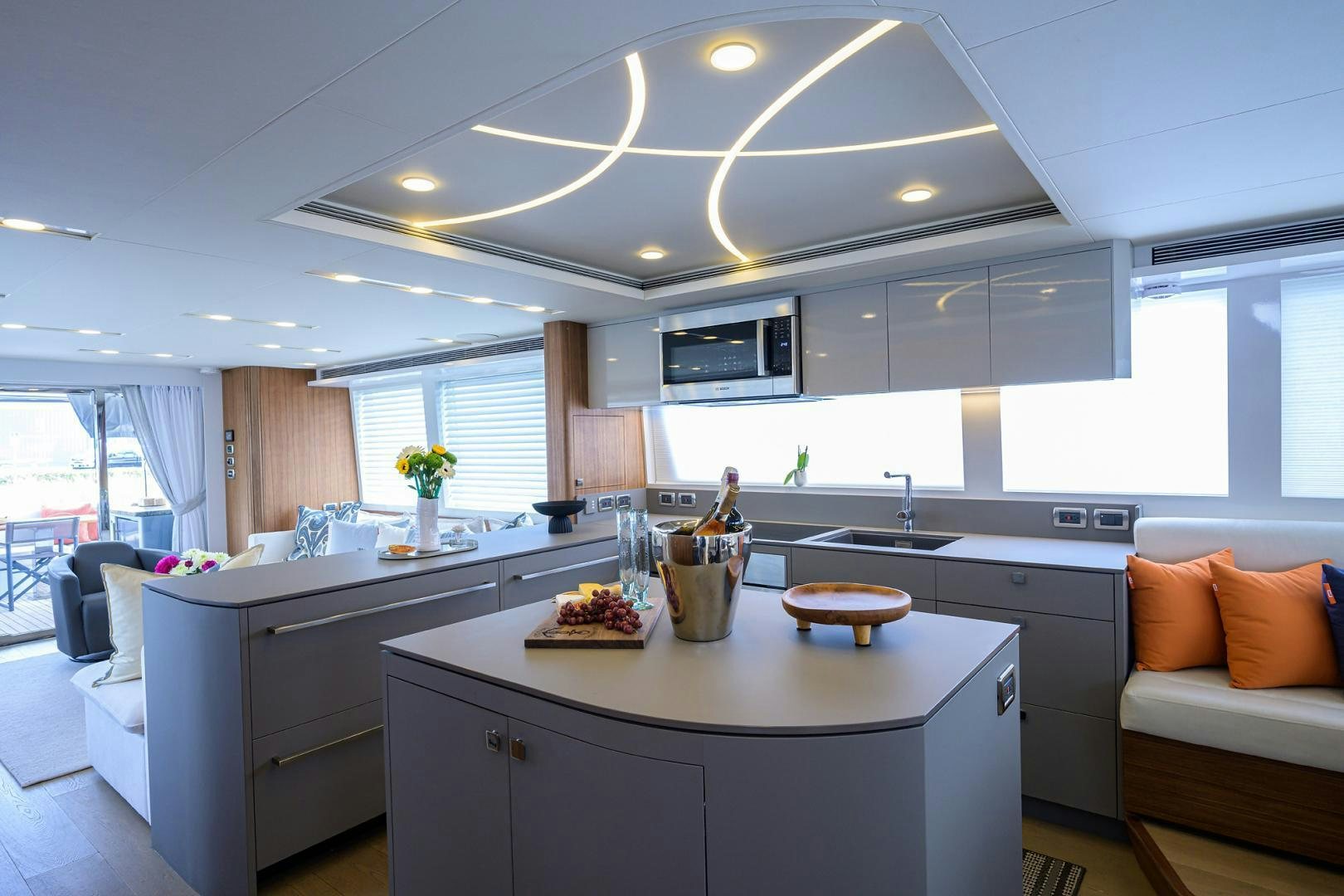 a kitchen with a large island aboard MY 3 GALS Yacht for Sale