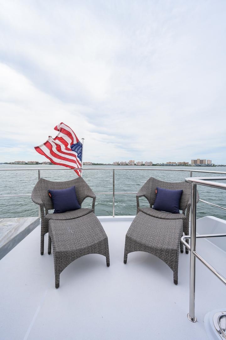 two chairs with a flag on them aboard MY 3 GALS Yacht for Sale