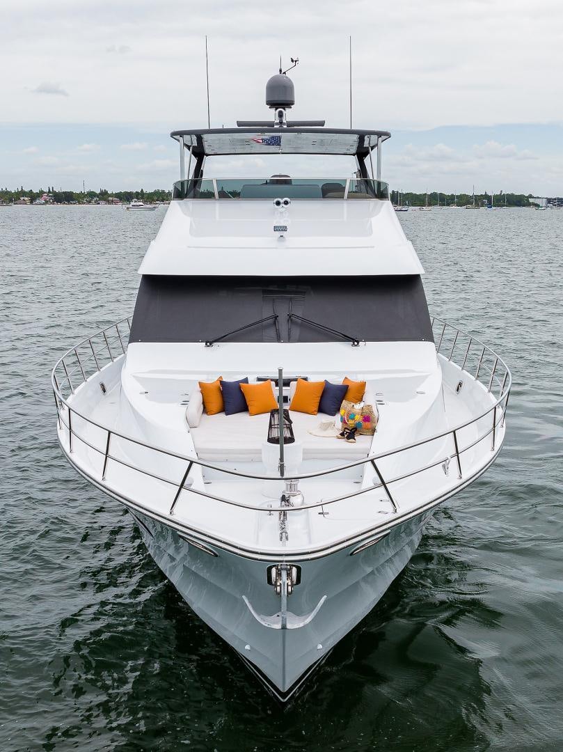 a white boat in the water aboard MY 3 GALS Yacht for Sale
