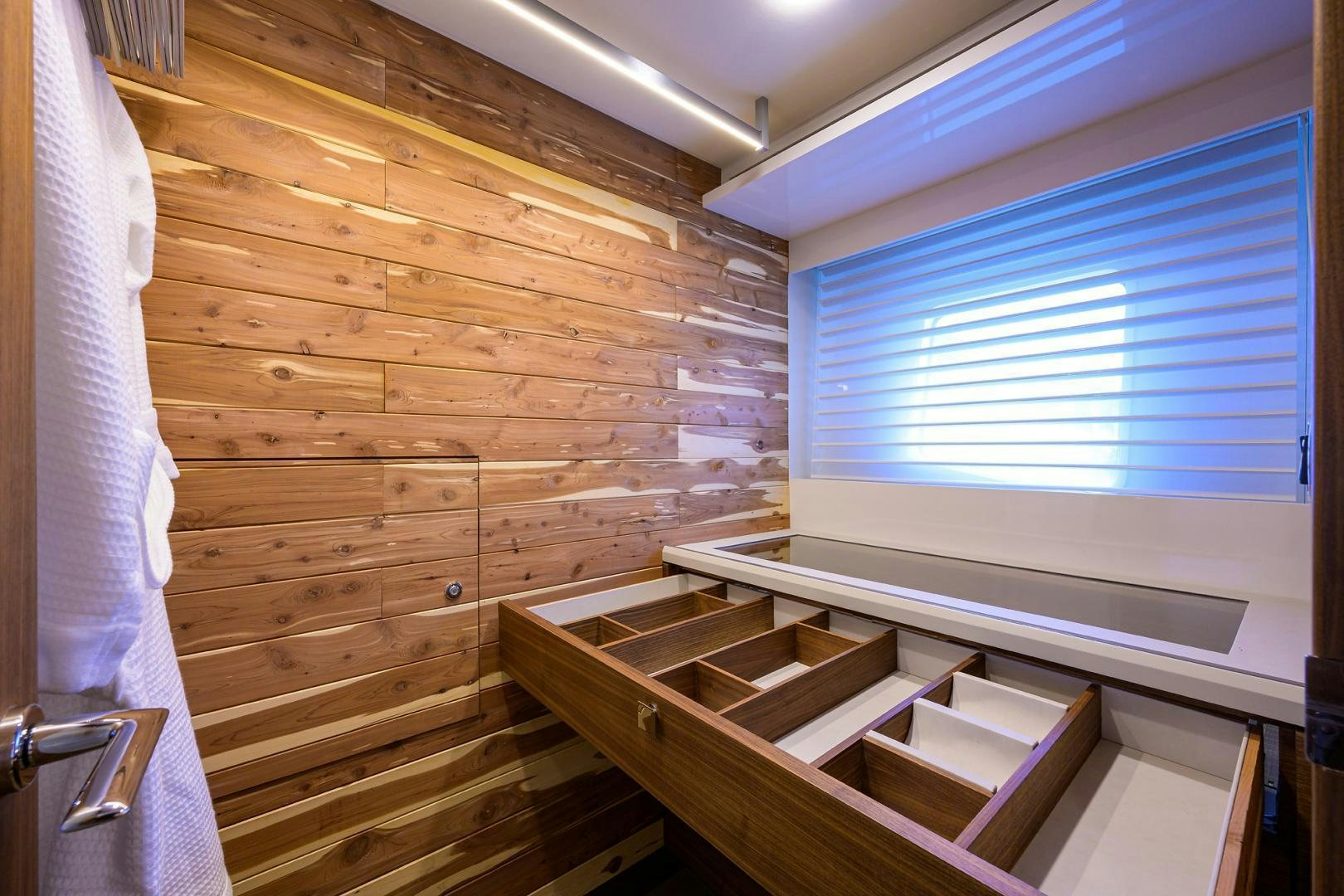 a room with a bed and a window aboard MY 3 GALS Yacht for Sale