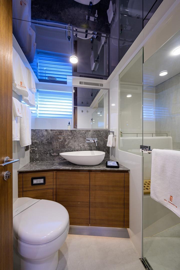 a bathroom with a toilet and sink aboard MY 3 GALS Yacht for Sale