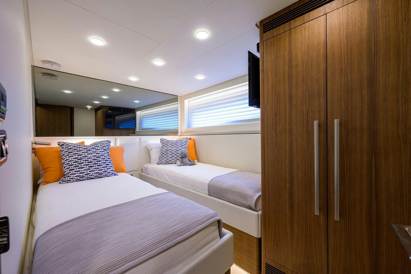 a room with a couple of beds aboard MY 3 GALS Yacht for Sale