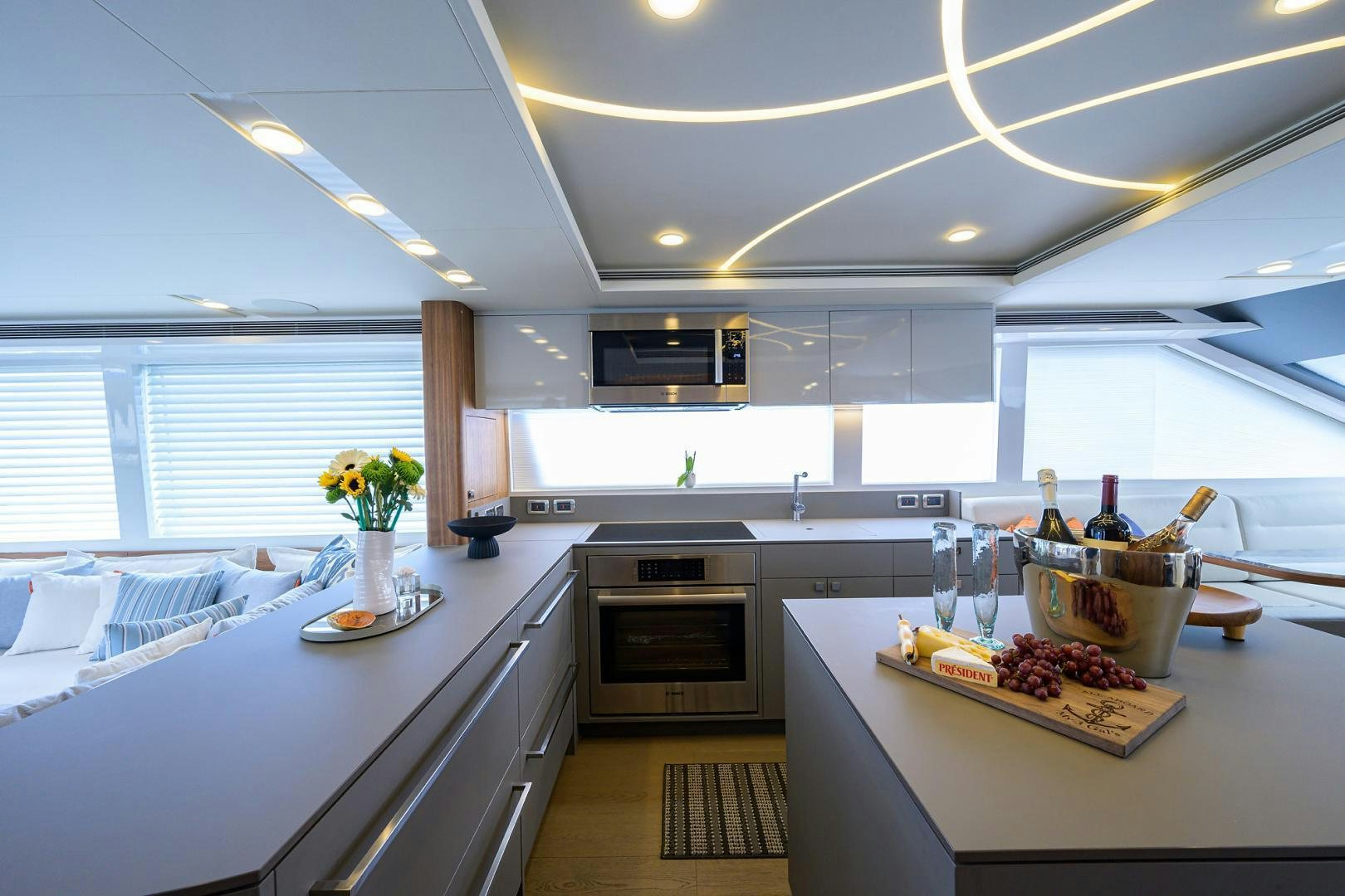 a kitchen with a large island aboard MY 3 GALS Yacht for Sale