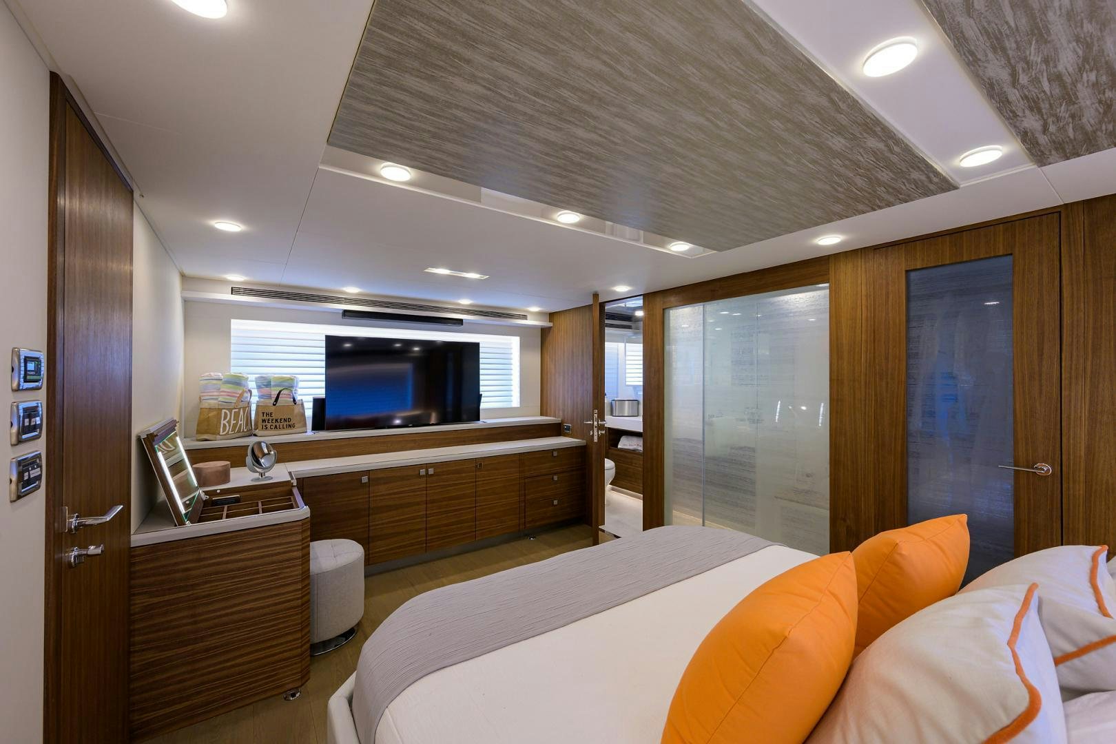 a room with a bed and a tv aboard MY 3 GALS Yacht for Sale