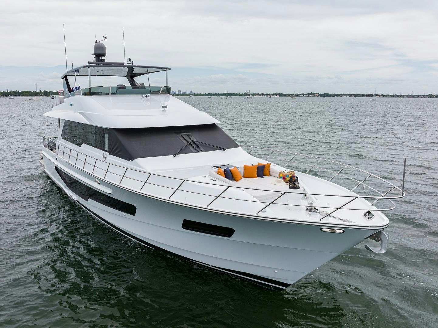 a white boat on the water aboard MY 3 GALS Yacht for Sale