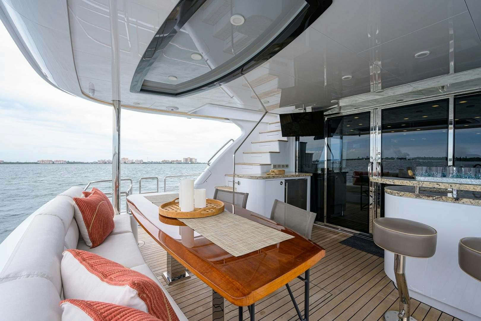 a room with a table and chairs aboard MY 3 GALS Yacht for Sale