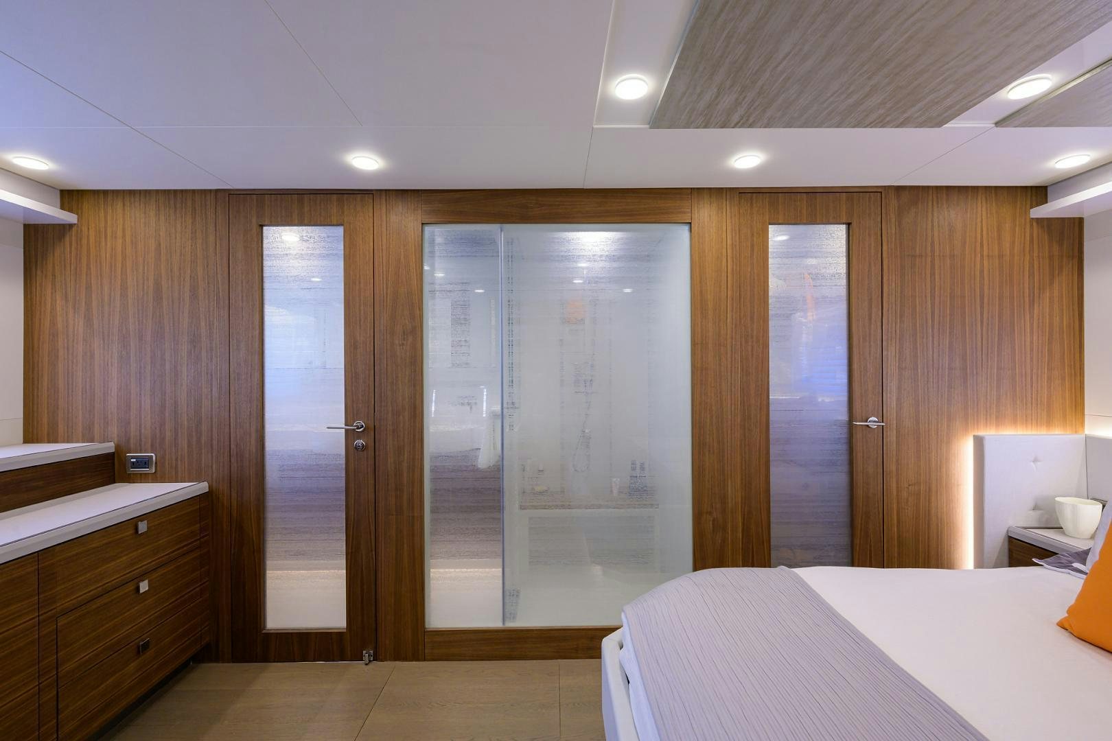 a room with a large glass door aboard MY 3 GALS Yacht for Sale