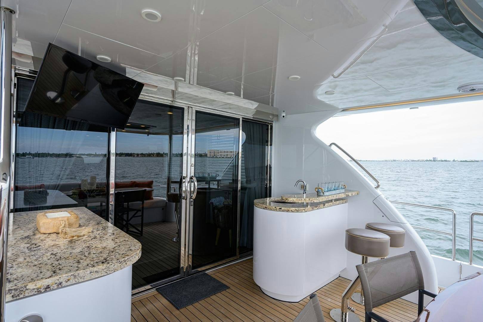 a large kitchen with a large glass shower aboard MY 3 GALS Yacht for Sale
