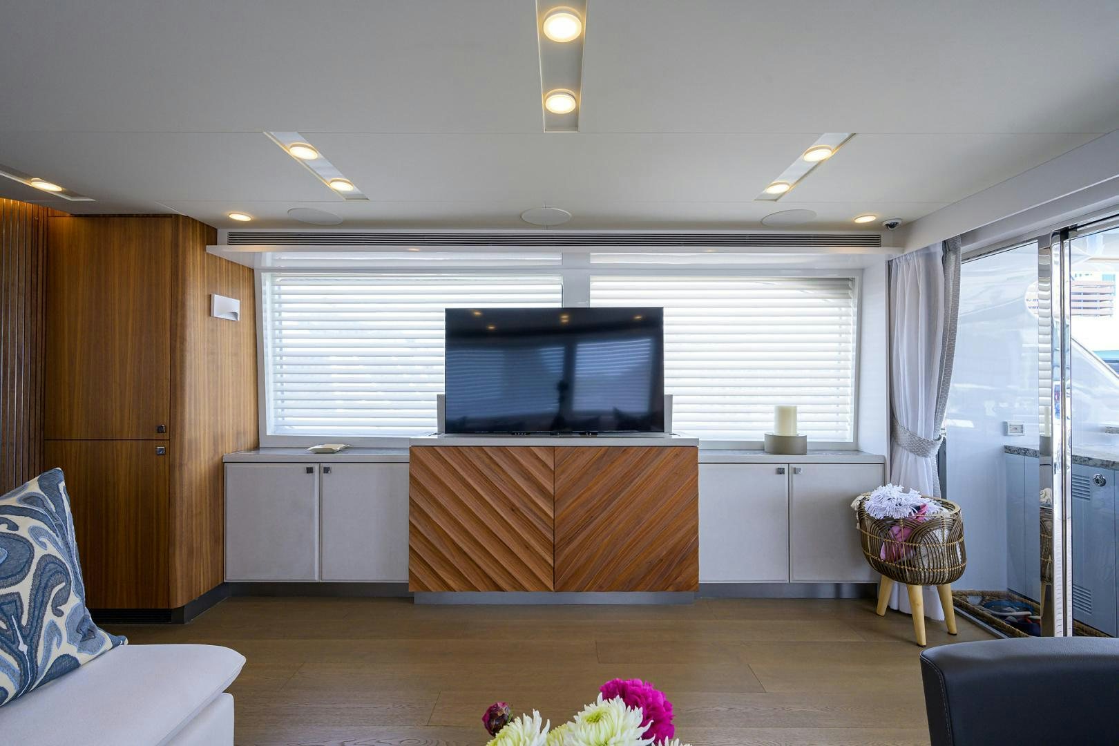 a room with a tv and a couch aboard MY 3 GALS Yacht for Sale