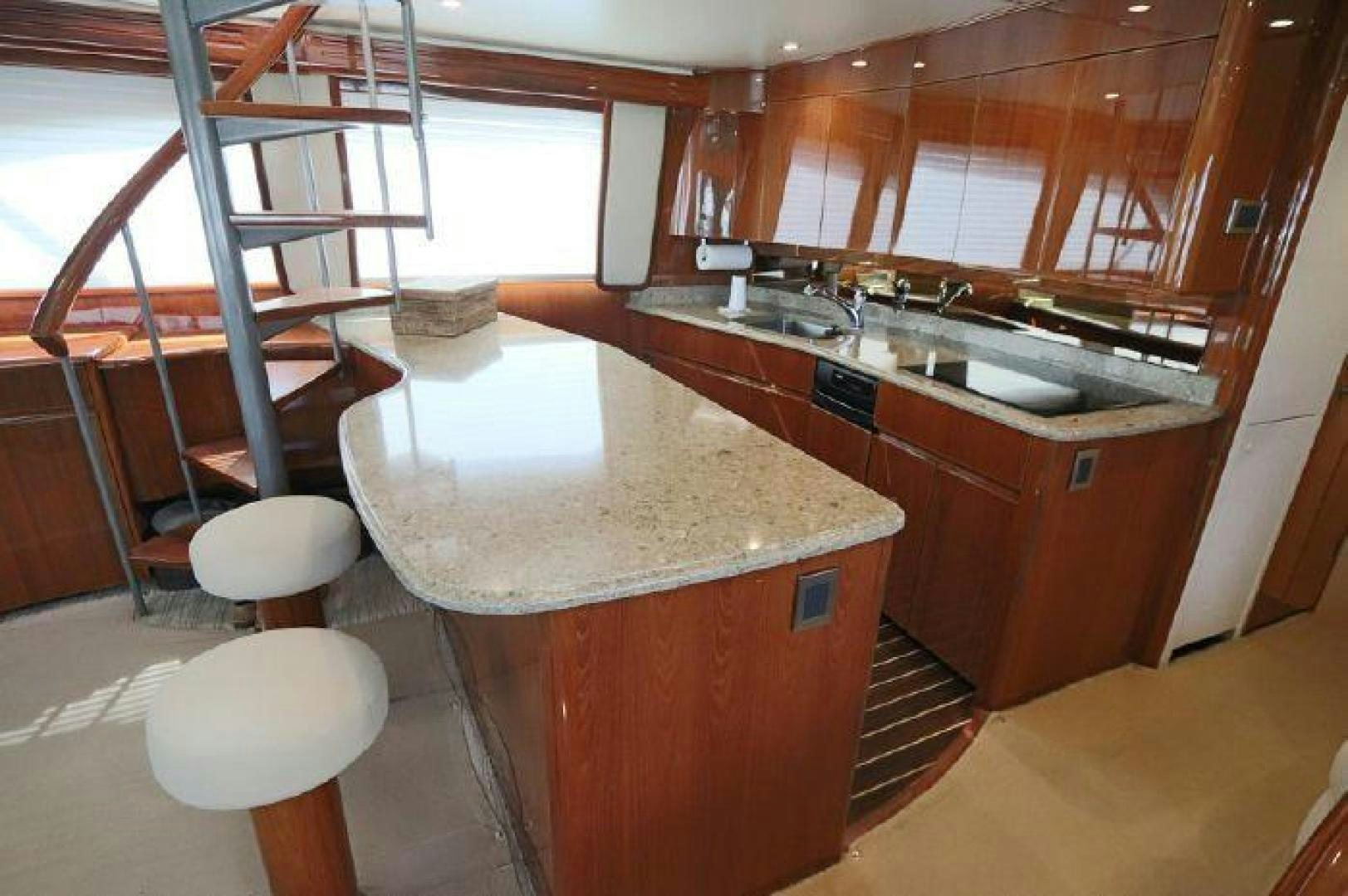 a kitchen with a bar and a ladder aboard GABEA Yacht for Sale