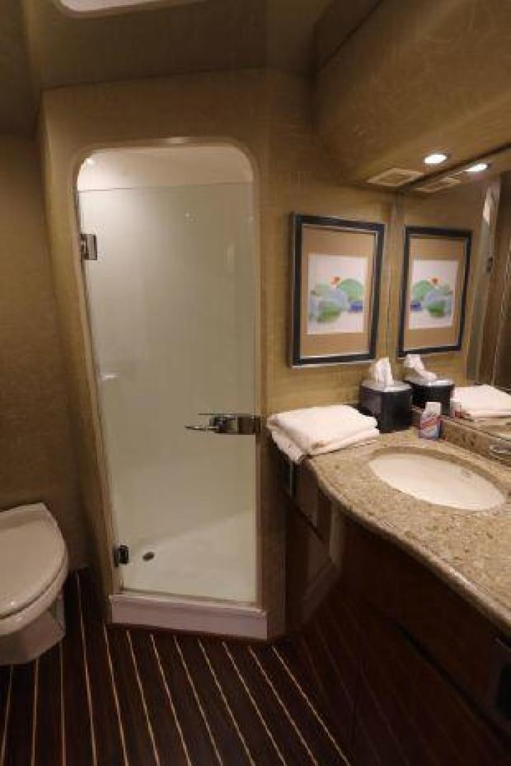 a bathroom with a sink and a shower aboard GABEA Yacht for Sale