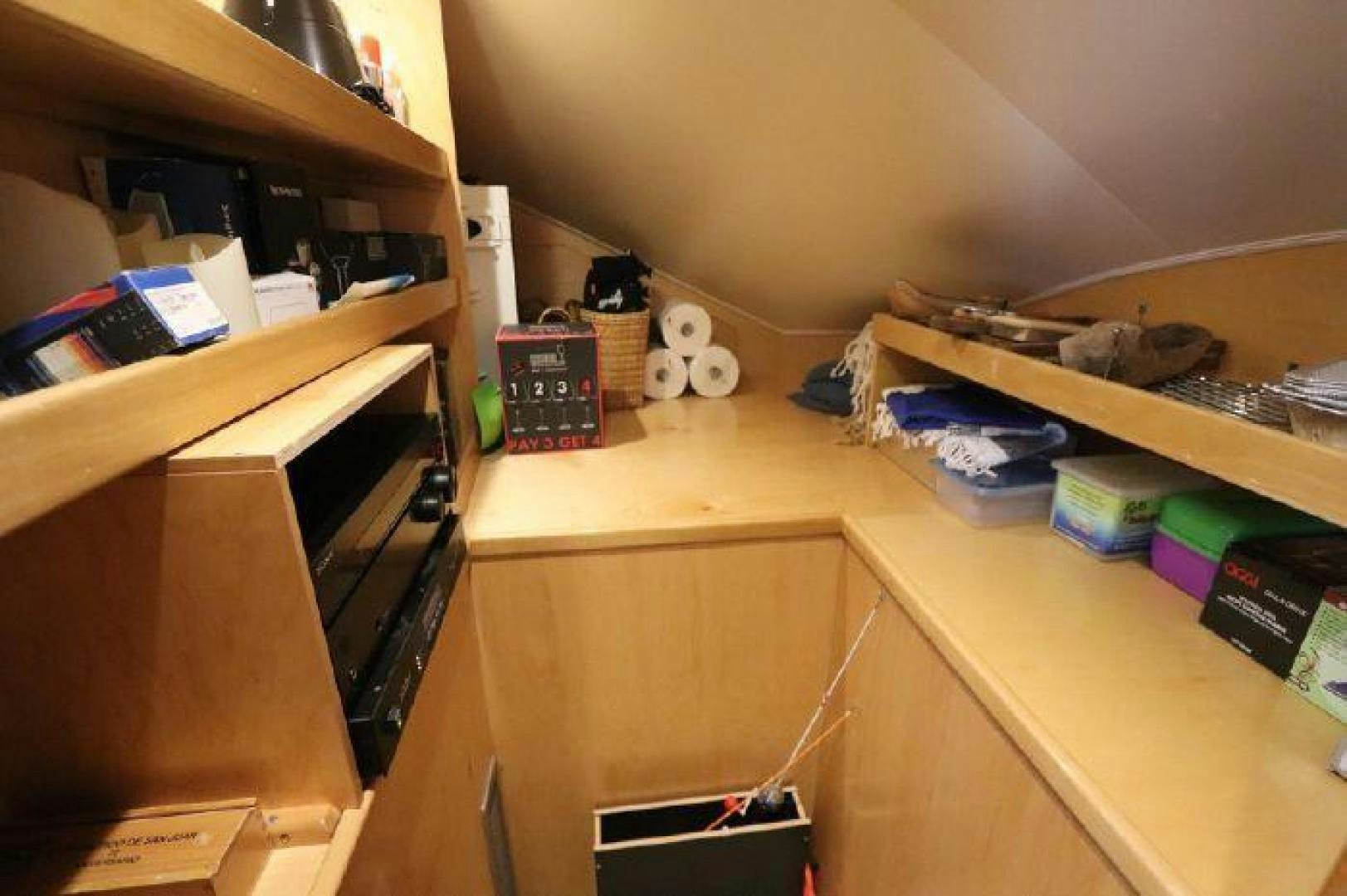 a shelf with objects on it aboard GABEA Yacht for Sale