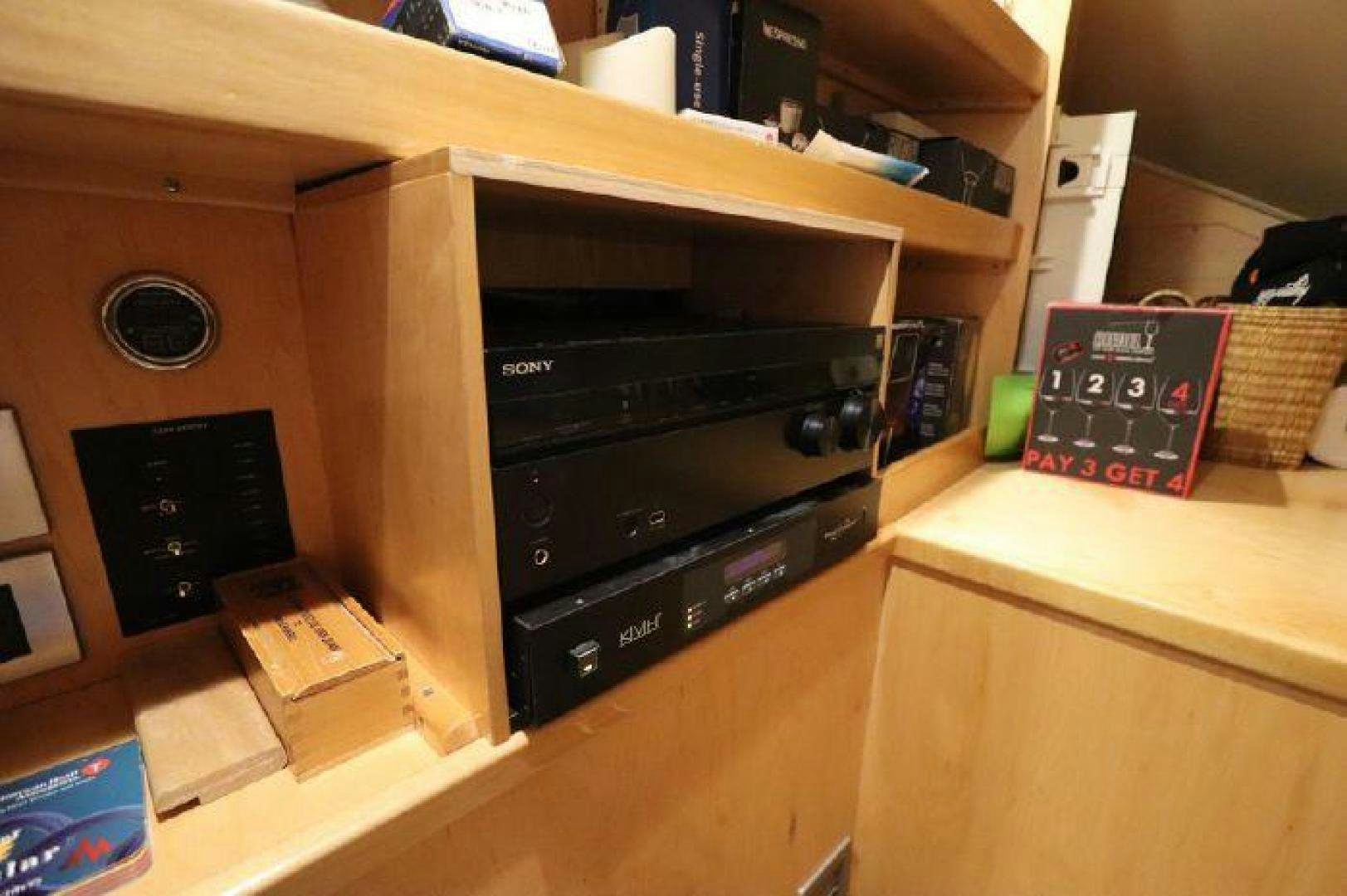 a shelf with electronic equipment aboard GABEA Yacht for Sale