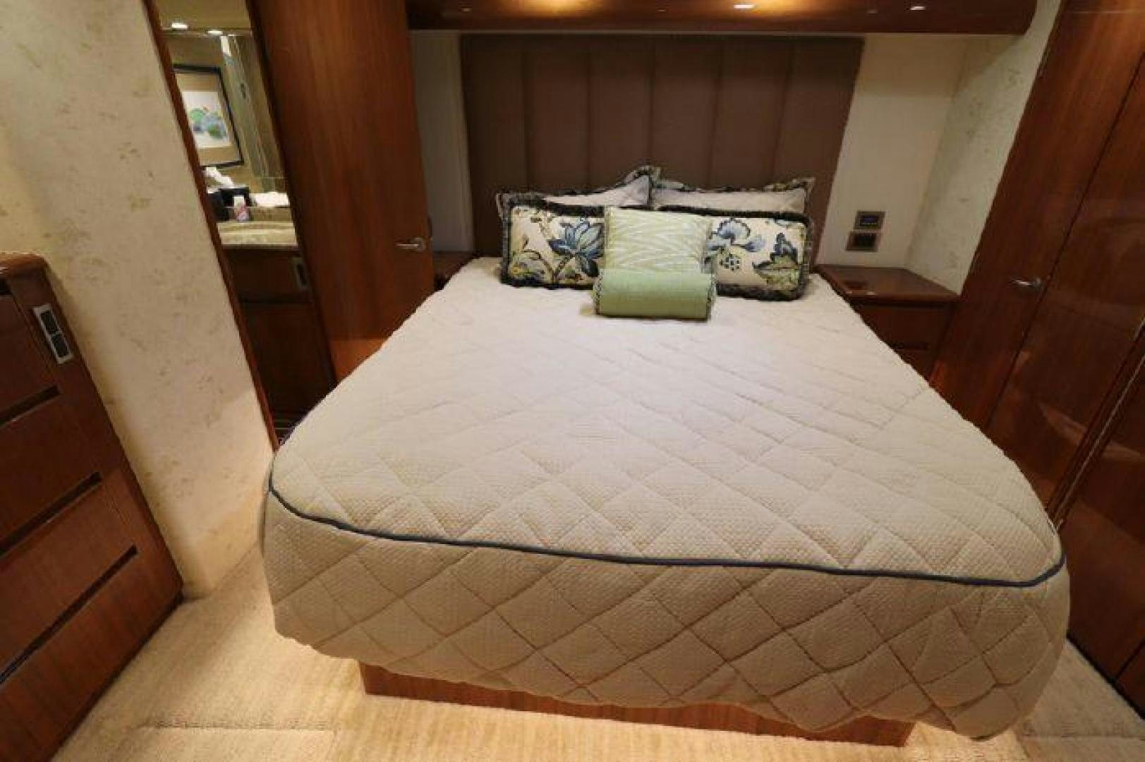 a bed with pillows aboard GABEA Yacht for Sale