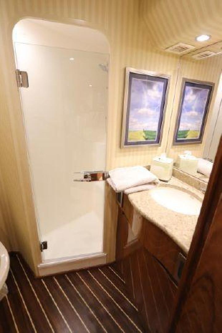 a bathroom with a sink and a mirror aboard GABEA Yacht for Sale