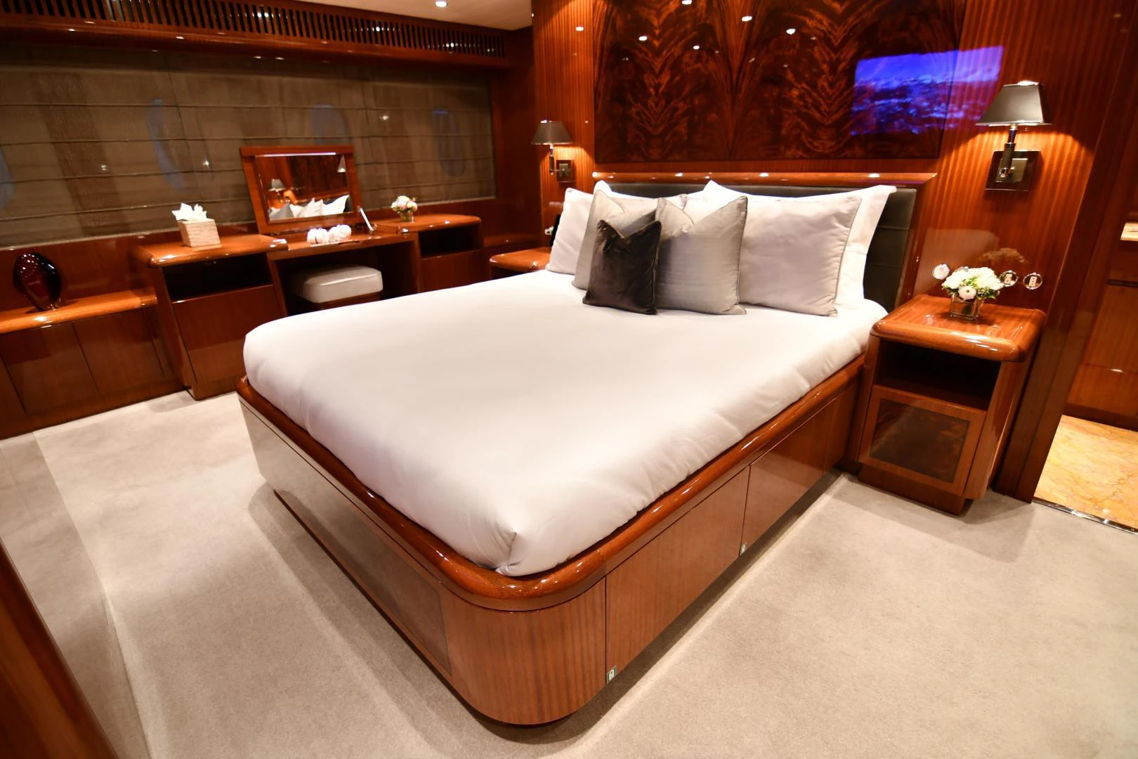 a bed with white sheets aboard OSE Yacht for Sale
