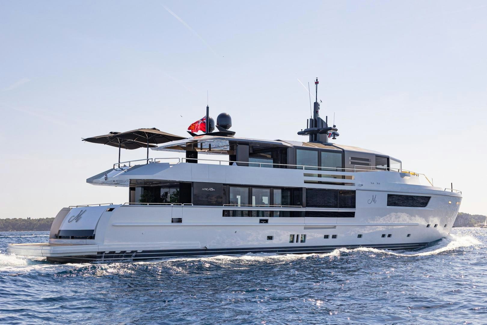 a large white boat aboard M Yacht for Sale