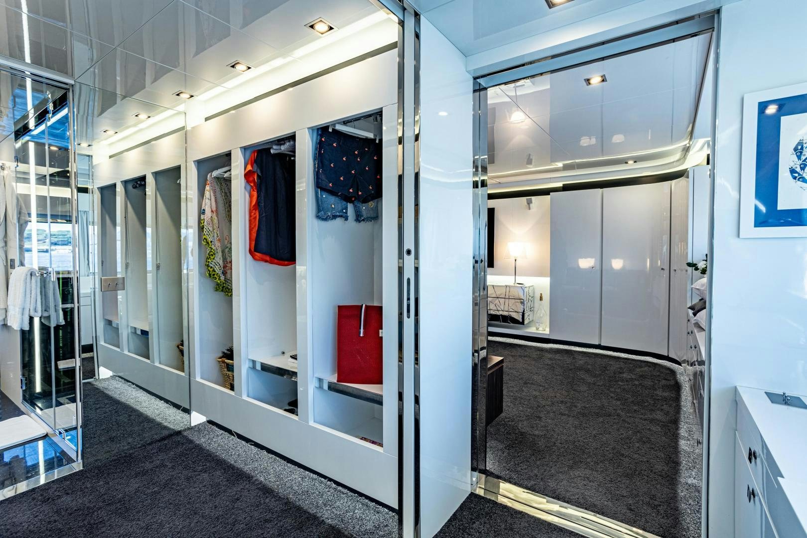 a room with a large mirror aboard M Yacht for Sale