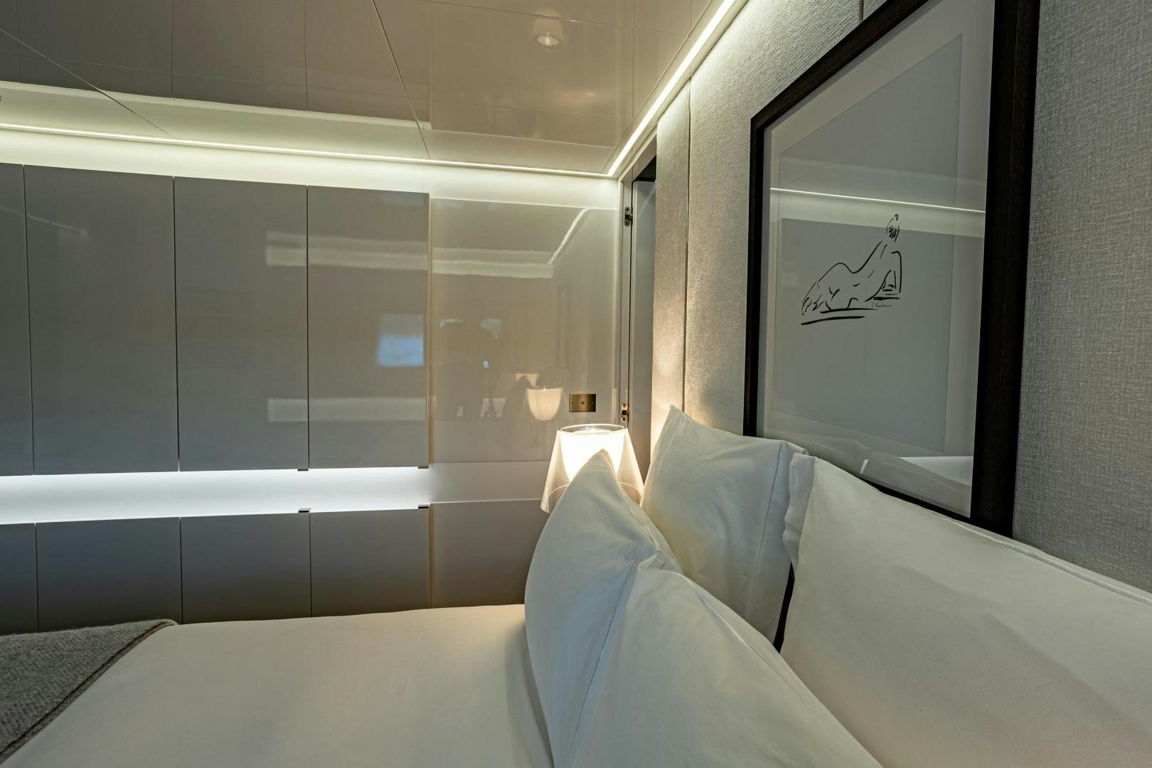 a room with a bed and a window aboard M Yacht for Sale