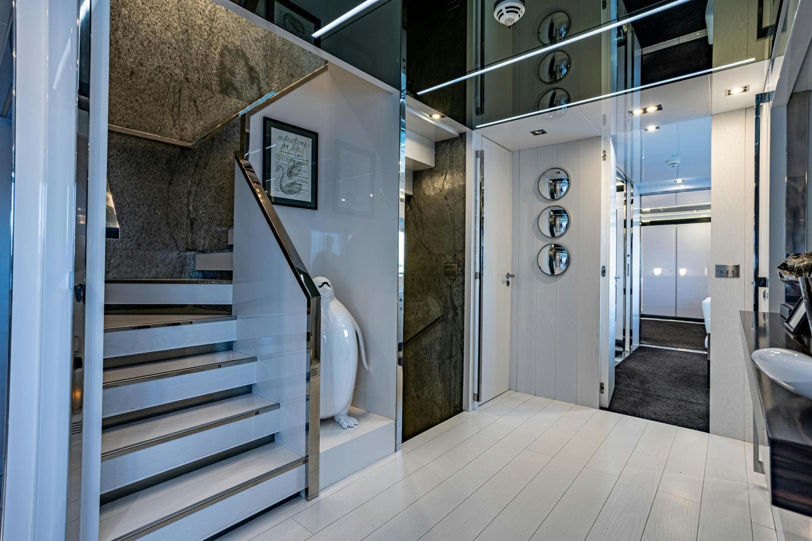 a bathroom with a marble shower aboard M Yacht for Sale