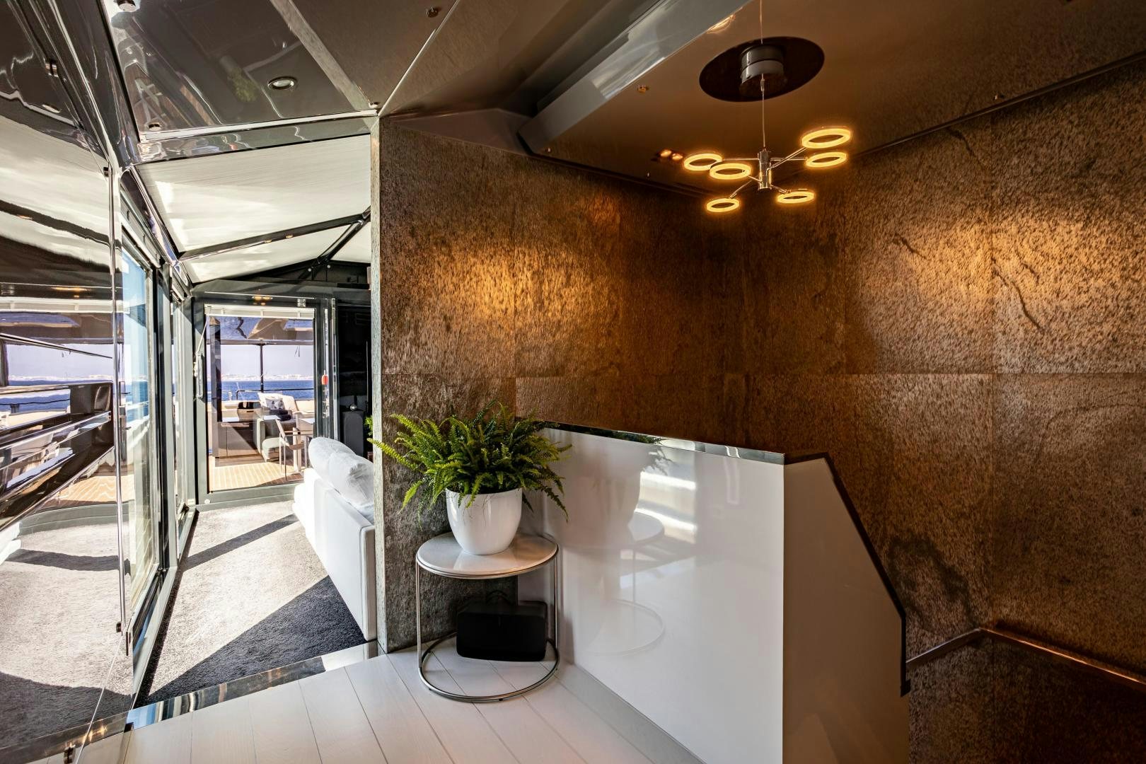 a room with a table and chairs aboard M Yacht for Sale