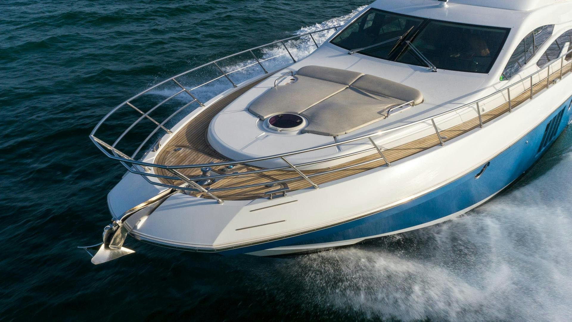 a white boat on the water aboard 4-PLAY Yacht for Sale