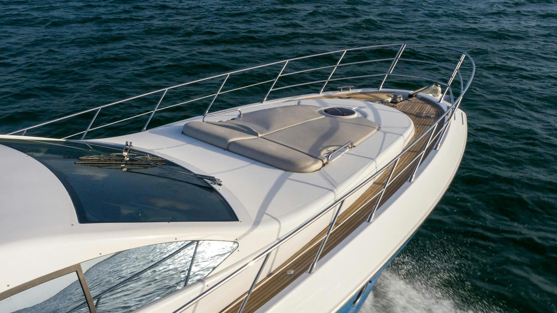 a white boat in the water aboard 4-PLAY Yacht for Sale