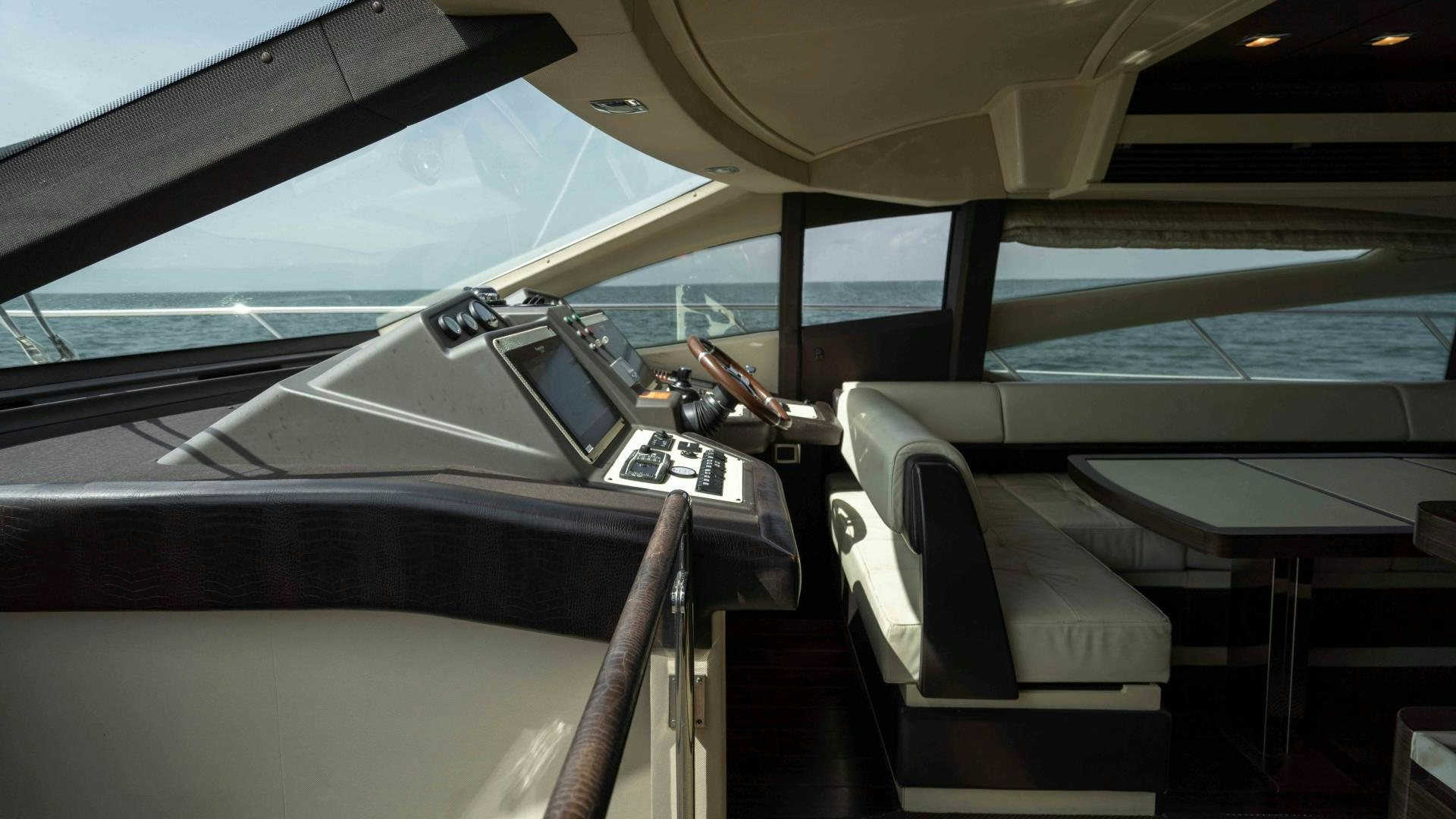 inside of a car aboard 4-PLAY Yacht for Sale