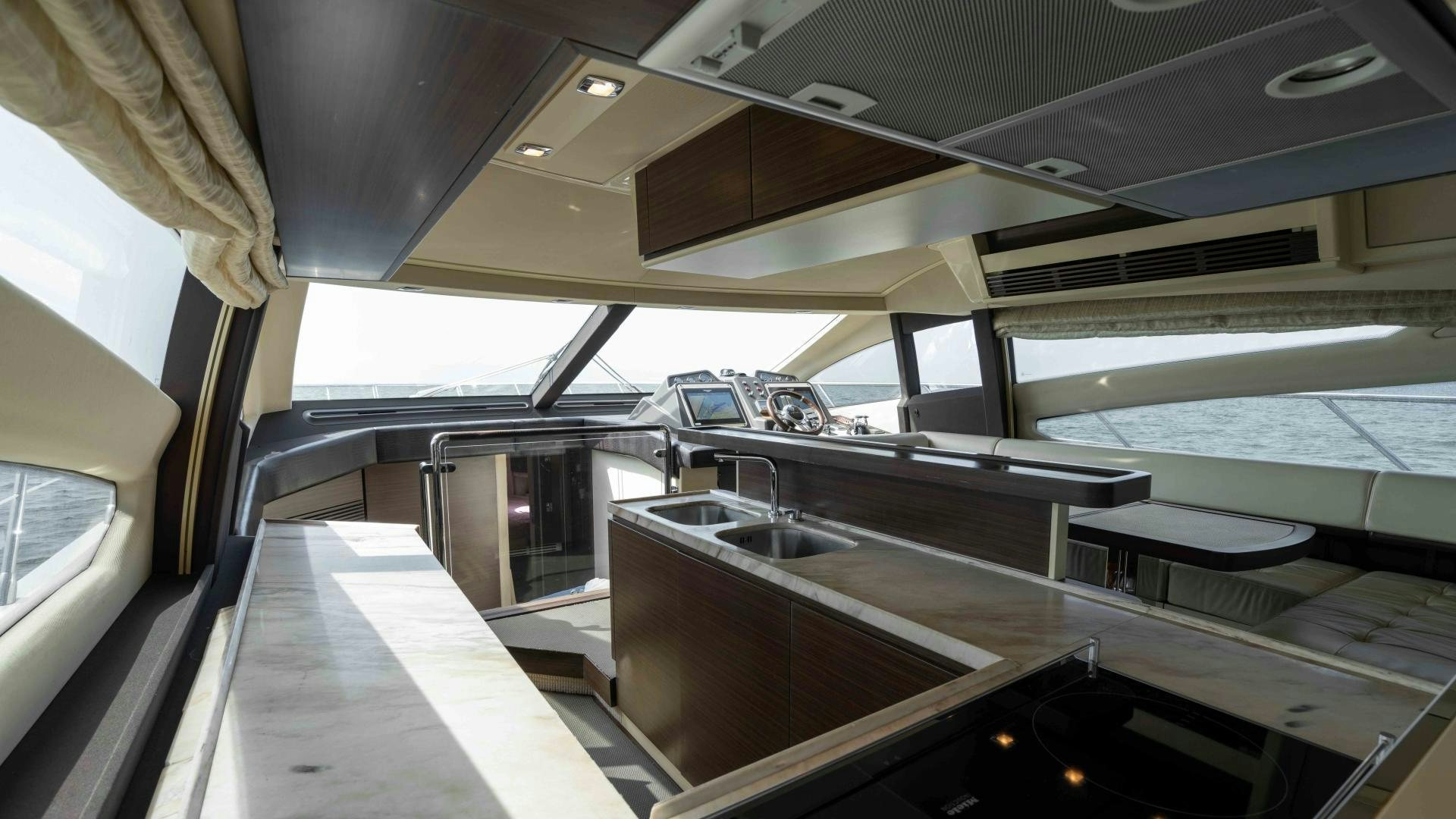 inside of a car aboard 4-PLAY Yacht for Sale