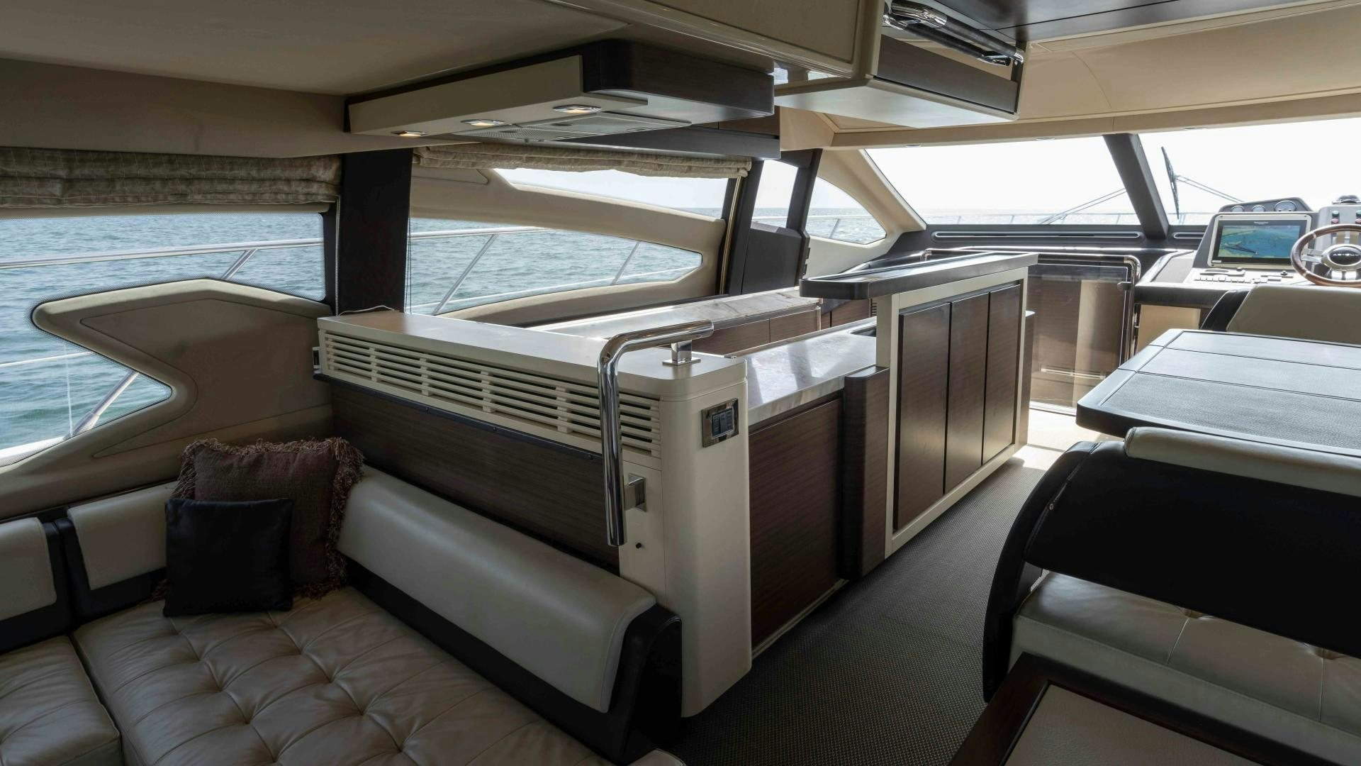 inside of a car aboard 4-PLAY Yacht for Sale