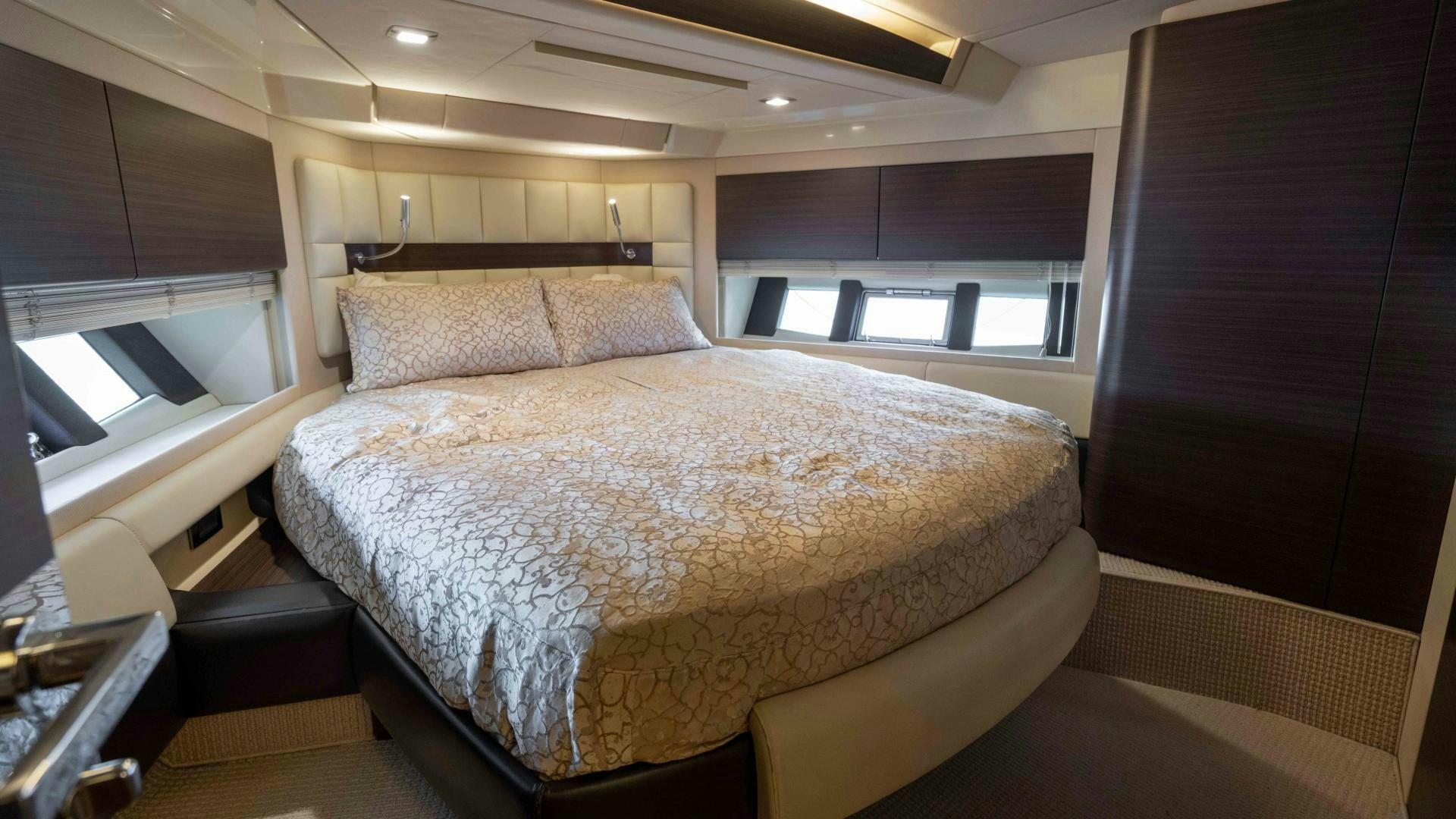 a bed in a room aboard 4-PLAY Yacht for Sale